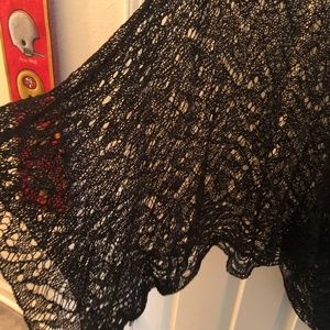 Womans open mesh poncho
